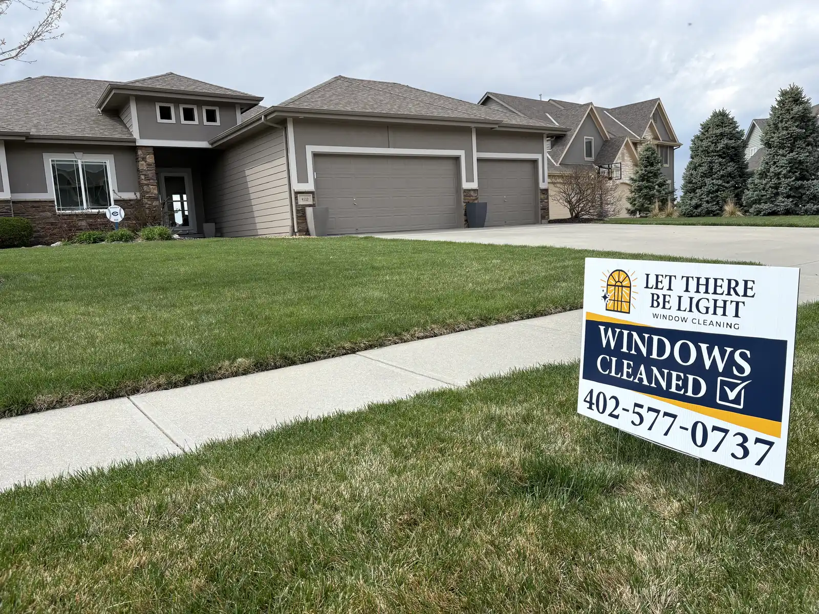Windows Cleaned yard sign on a customer's lawn