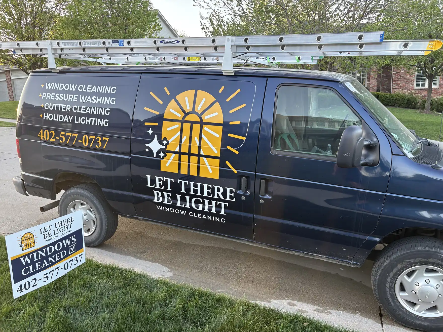 Work van with ladders racked and ready for the day's appointments