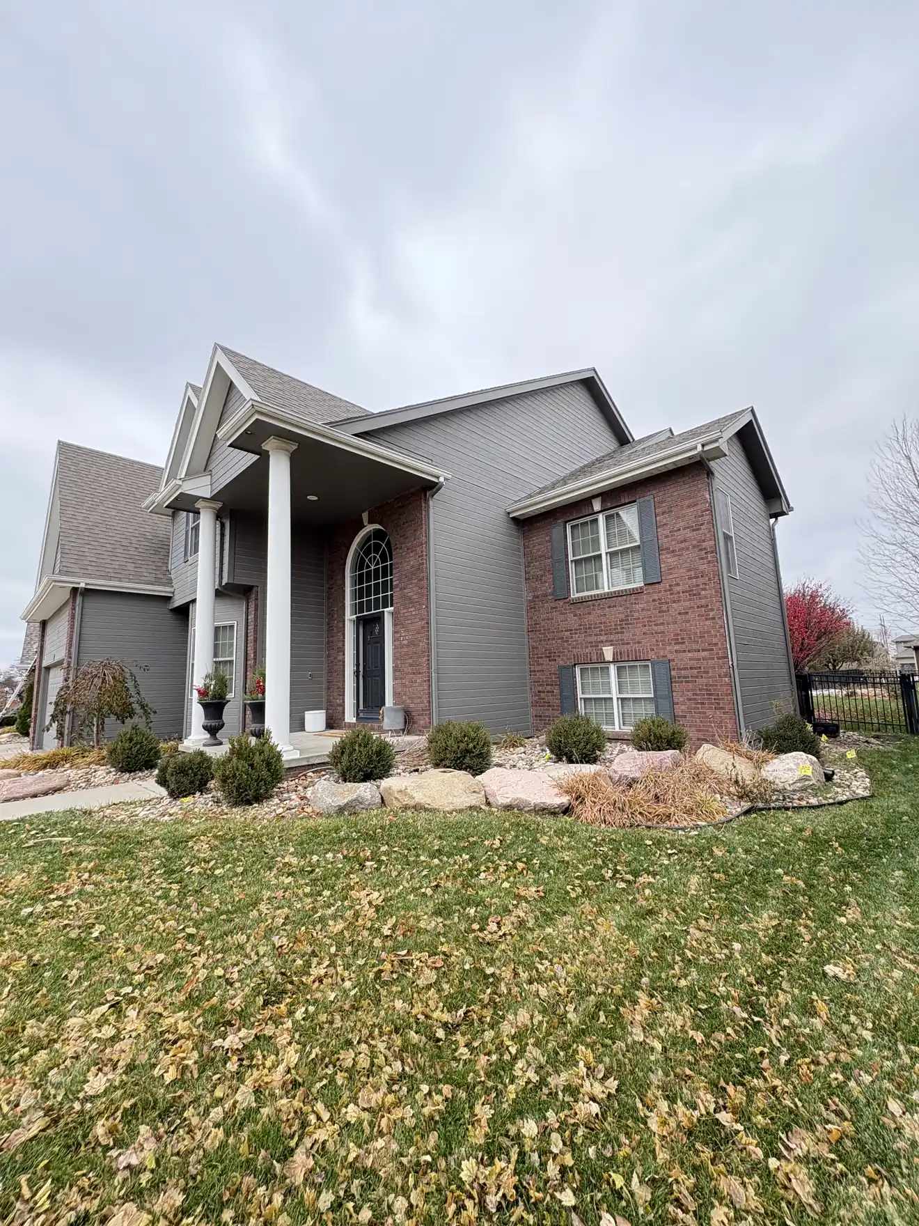 Interior glass cleaned and hand-detailed on a two-story home in Omaha, Nebraska — with tracks and sills detailed